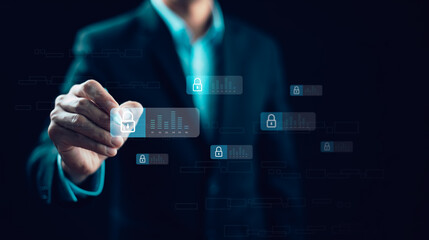 A businessman interacts with a futuristic digital security interface, selecting a locked data icon. The concept represents cybersecurity, data protection, encryption, and secure business networks.
