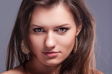 Fototapeta premium Beauty Concepts. Closeup Portrait of Long hear Healthy Woman With Healthy Beauty Silk Skin as Face Closeup Portrait