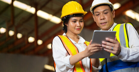 Obraz premium Professional Mechanical Engineer team Working on Personal Computer at metal sheet profiling industrial manufacturing factory. Product quality Inspection
