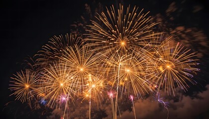 Fototapeta premium Radiant Gold Bursts A Dazzling Night Sky Celebration