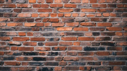 Textured red and brown brick wall background with uneven mortar joints, displaying a rustic and aged appearance for design and architectural use.