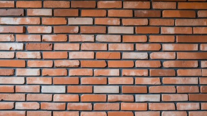 Fototapeta premium Textured brick wall background with a blend of light brown and reddish-orange bricks arranged in a uniform pattern for design use.