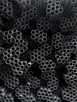 Grey Pipes in a Pile 
