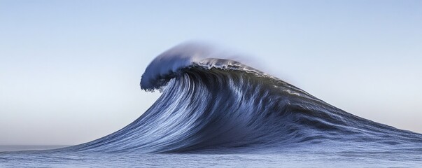 A large ocean wave crashing with great force in the water