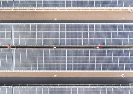 Aerial View of Solar Panel Covered Parking Lot for Renewable Ene