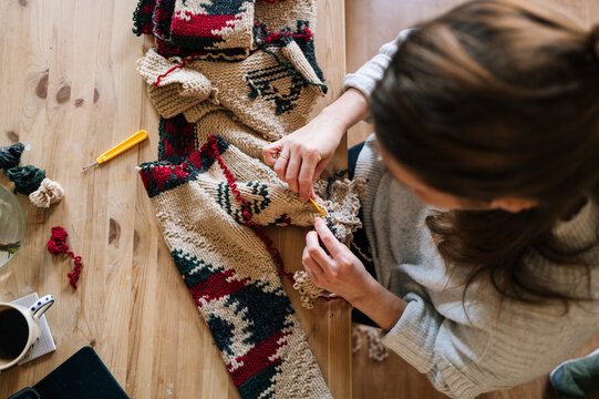Upcycling process of a knitted sweater