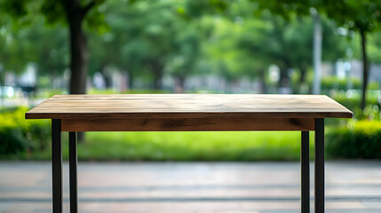 Fototapeta premium Rustic Wooden Table With Metal Legs Outdoors in Green Park Setting