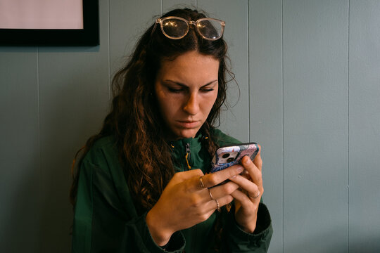 young woman sending a text 