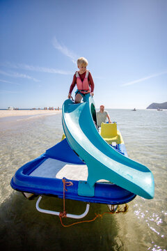 family having fun on catamaran ride