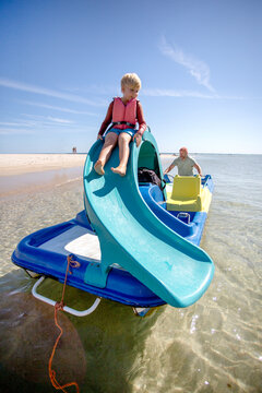 family having fun on catamaran ride