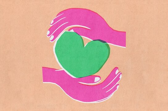 Hands Holding a Heart Symbol. Care and love concept