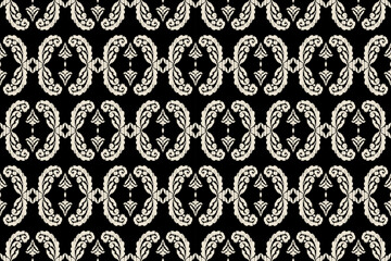 Carpet ikat floral pattern,fabric pattern on navy blue background vector illustration.Ikat ethnic oriental embroidery.Aztec style,abstract background.design for texture,clothing,decoration,carpet,rug.