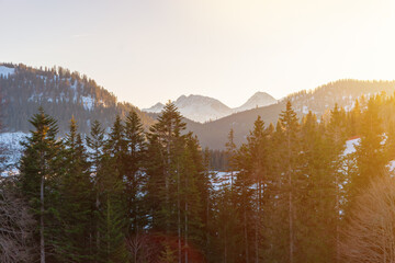 Snowy alpine mountain peaks in the winter sunshine create a mesmerising landscape.