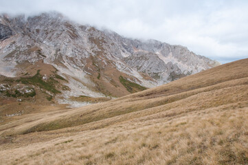 Republic of Adygea in autumn with its grass-covered slopes and part of the Mount Pshekhu-Su,...