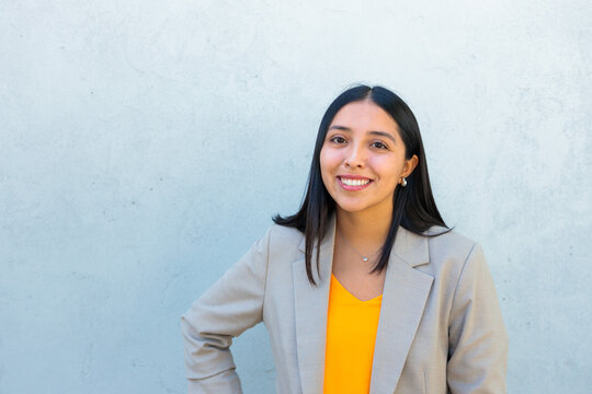 Young latin professional woman smiling