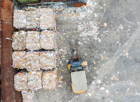Aerial View of Compressed Paper Bales at Recycling Facility
