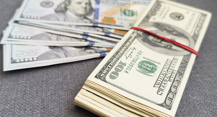 Background of US dollar bills. View from above. American vintage money cash, hundred dollar bills