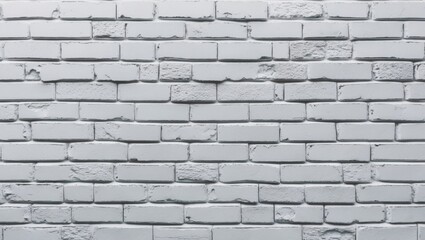 Fototapeta premium White brick wall texture with subtle roughness and even light gray tones, ideal for background use with ample copyspace for text or design.