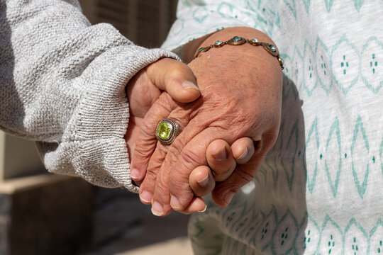 Seniors Holding Hands