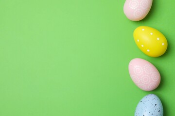Happy Easter. Colorful eggs on color background, space for text or advertising