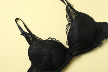 Flat lay with women romantic underwear on beige background, top view