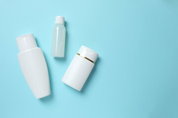 Natural cosmetic products a blue background, top view