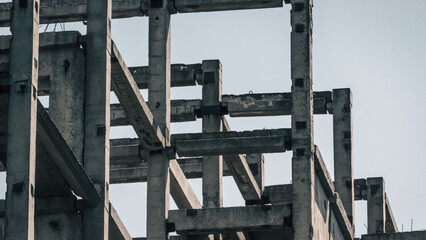 abstract background fragment of a building from concrete blocks on a light background