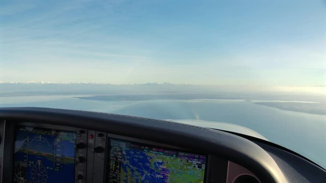 Pilot's View From Cockpit Flying a Propeller Airplane on a Sunny Day