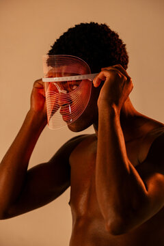 Man Wearing Futuristic LED Face Shield