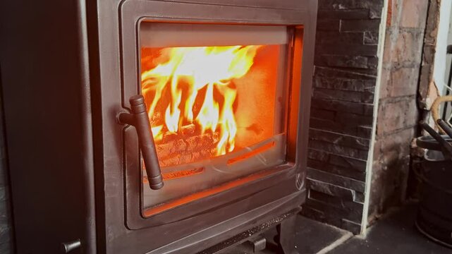 flames in a hot domestic log burner