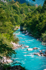 Fototapeta premium The Soča River in Kobarid. Immersion in nature.