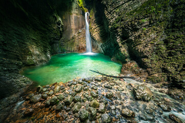 Immersion in the greenery. Kobarid natural waterfalls of Kozjak. Wonder of nature