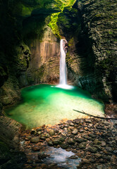 Immersion in the greenery. Kobarid natural waterfalls of Kozjak. Wonder of nature