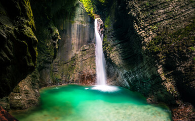 Immersion in the greenery. Kobarid natural waterfalls of Kozjak. Wonder of nature