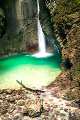 Immersion in the greenery. Kobarid natural waterfalls of Kozjak. Wonder of nature