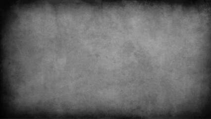 Dark textured grey wall closeup.Dark grey textured concrete wall background