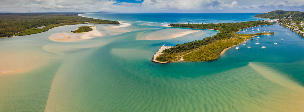 Coastal river mouth with sand bars and islands - Powered by Adobe