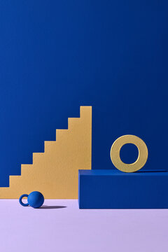 Minimal primitive yellow and blue shapes, podium and stairs