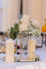 Elegant wedding reception with white floral decorations