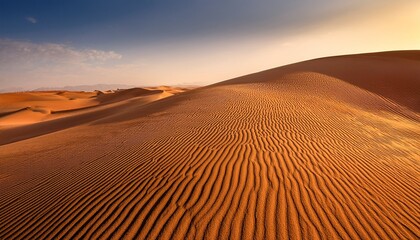 Naklejka premium Golden Sand Dune Serenity. Close-up soft dunes, wavy wind patterns. Warm desert tones. Timeless & tranquil landscape.