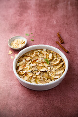 Apple tart with almond flakes