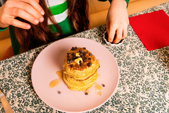Pancakes with Chocolate Chips and Syrup