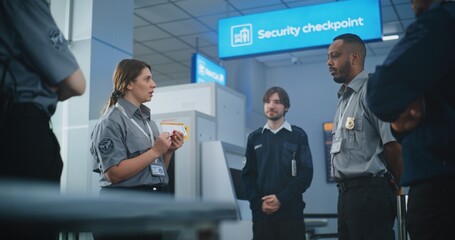 Airport Staff Briefing: Female Security Officer Providing Instruction, Holding Boarding Pass,...