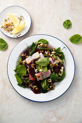 Herring salad with beetroot and spinach