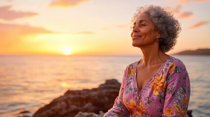 Woman contemplates serene ocean sunset scene