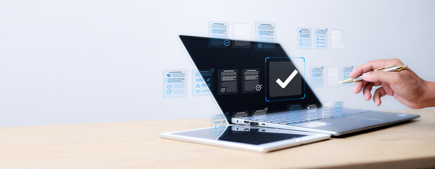 Businessman tick mark an assessment, online survey online exam choose the right answer in the exam,...