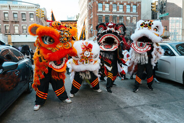 Performers in lion dance costumes on Chinese New Year parade