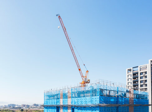 Tower Crane at Urban Residential Construction Development Site