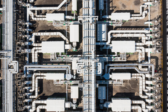 Aerial View of Industrial Facility with Pipe Network and Equipme