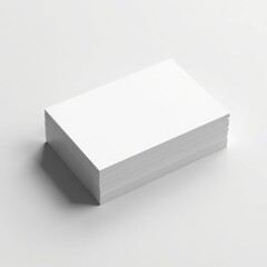 Fototapeta premium Neatly stacked blank business cards on white background, template, stack